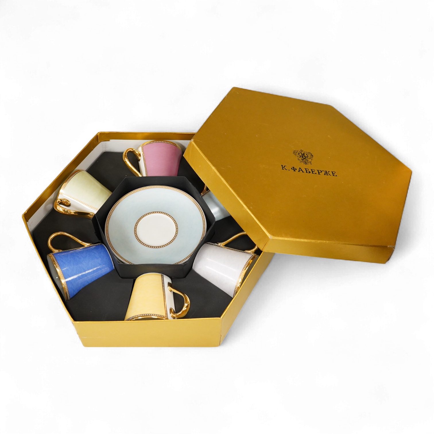 A Royal Collection of Faberge set of six bone china cups and saucers, boxed